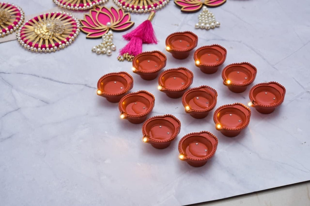 Traditional Glow Meets Modern Tech – LED Water Sensor Diyas (Set of 6/12/18/24)